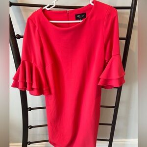 Bright coral dress.  Ruffle sleeve. Great for vacation!
